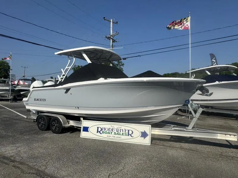 Slide: The Image of 2025 Blackfin 252 DC boat on trailer at Rhode River Boat Sales. - 1