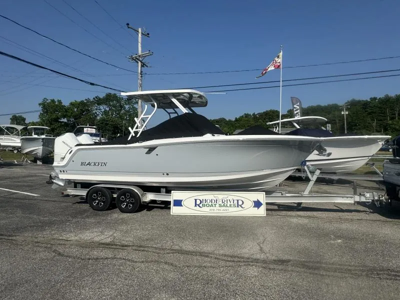 Slide: The Image of 2025 Blackfin 252 DC boat on trailer at Rhode River Boat Sales. - 2