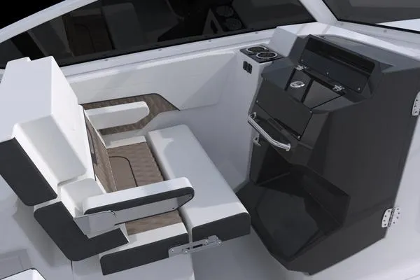 Slide: The Image of 2025 Blackfin 302 DC boat interior with modern seating and sleek console design. - 10