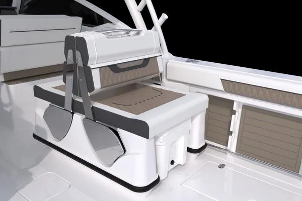 Slide: The Image of 2025 Blackfin 302 DC boat interior with sleek seating and storage compartments. - 6