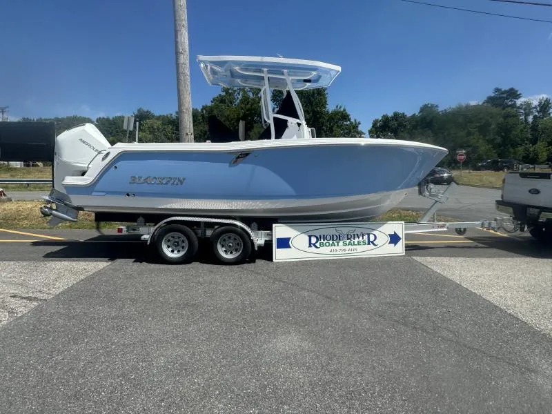 Slide: The Image of 2025 Blackfin 222 CC boat on trailer at Rhode River Boat Sales. - 2