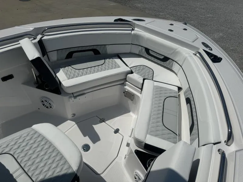 Slide: The Image of 2025 Blackfin 222 CC boat interior with luxurious seating and modern design. - 8