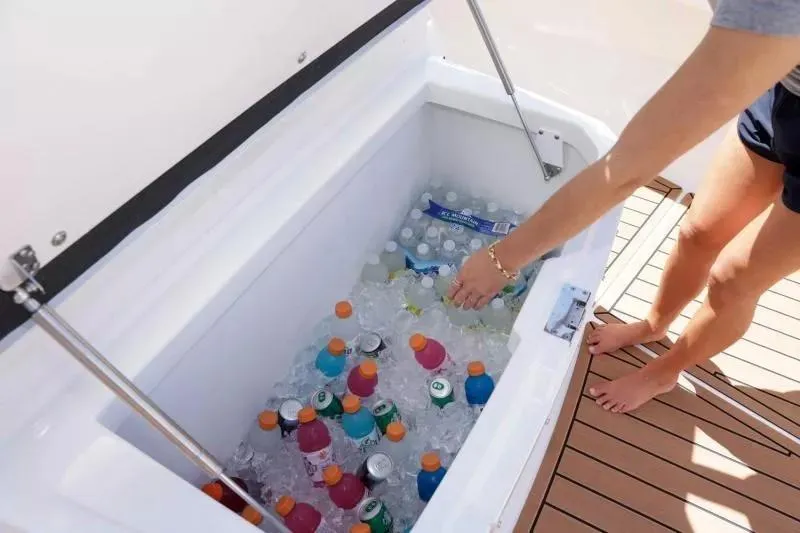 Slide: The Image of Cooler with drinks and ice on 2023 Formula 387 Center Console Fish boat. - 10