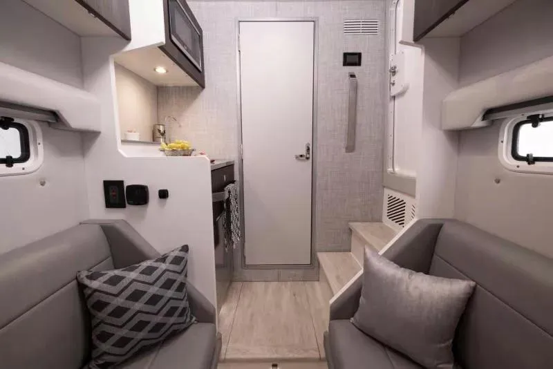 Slide: The Image of 2023 Formula 387 Center Console Sport interior with modern seating and sleek design. - 19