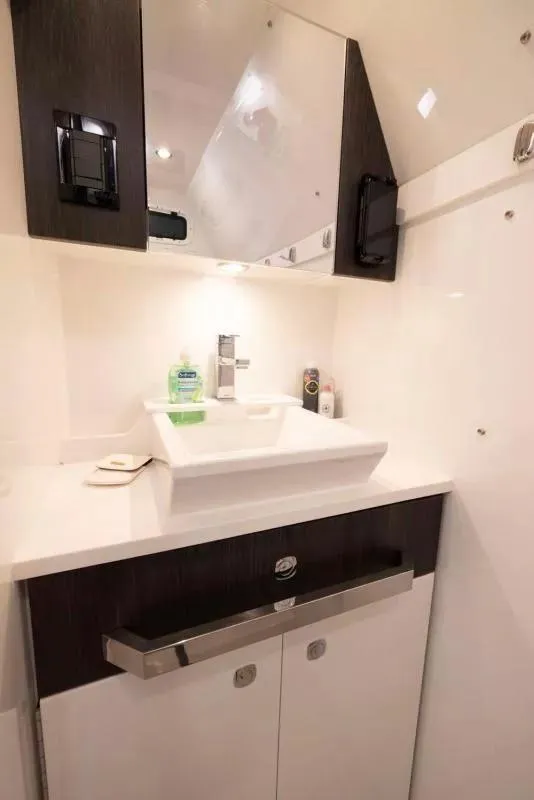 Slide: The Image of Luxury bathroom interior of 2023 Formula 387 Center Console Sport boat. - 20