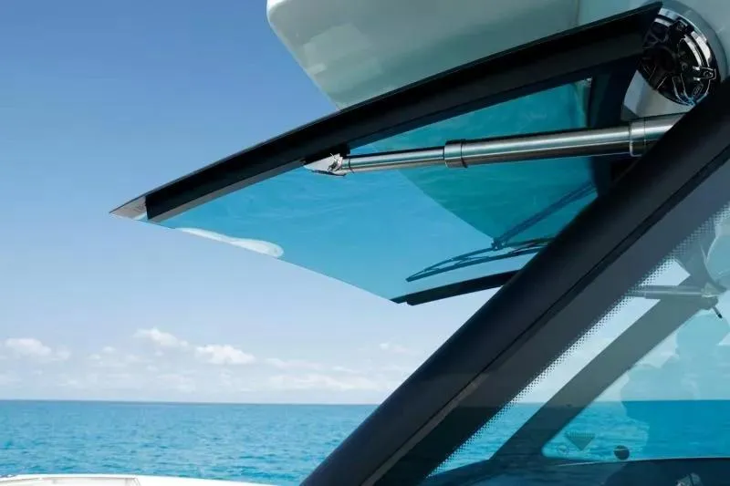 Slide: The Image of 2023 Formula 387 Center Console Sport windshield detail against ocean backdrop. - 9
