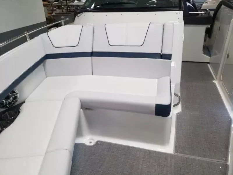 Slide: The Image of 2021 Formula 350 Crossover Bowrider interior with white seating and modern design. - 16