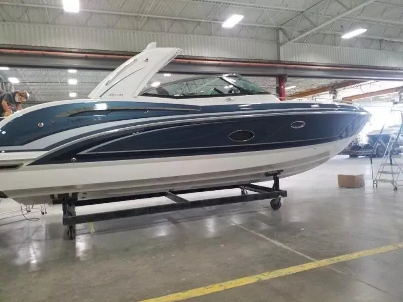 Slide: The Image of 2021 Formula 350 Crossover Bowrider in a warehouse setting. - 5