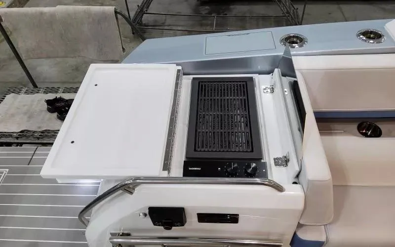 Slide: The Image of 2024 Formula 430 All Sport Crossover boat with built-in grill and seating area. - 17