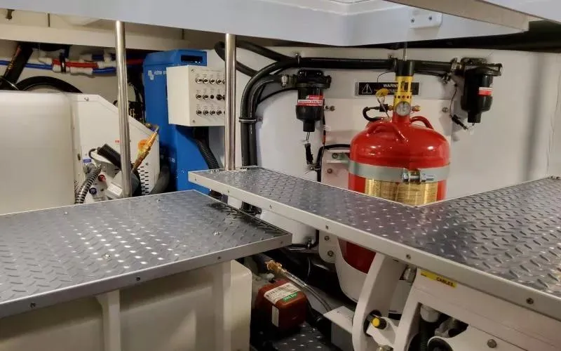 Slide: The Image of Engine room of 2024 Formula 430 All Sport Crossover with safety equipment and control panels. - 20