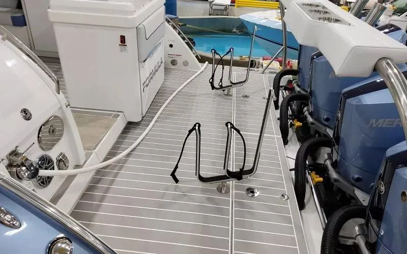 Slide: The Image of 2024 Formula 430 All Sport Crossover boat deck with equipment and engines. - 7