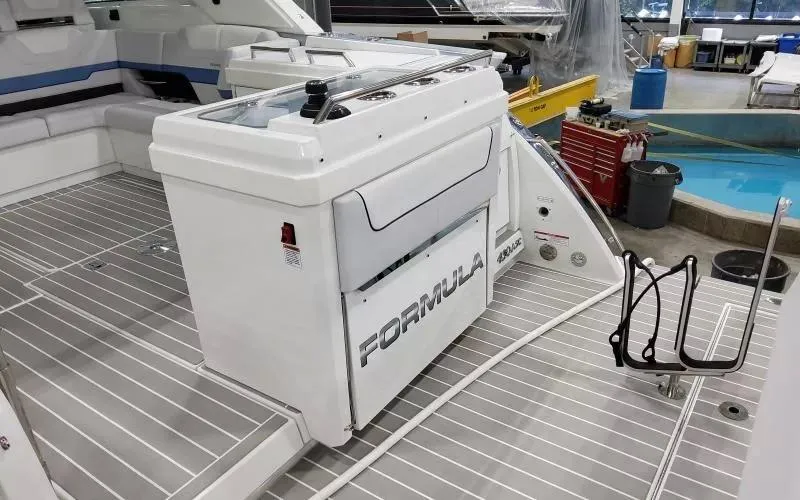 Slide: The Image of 2024 Formula 430 All Sport Crossover boat interior with sleek design and modern amenities. - 9