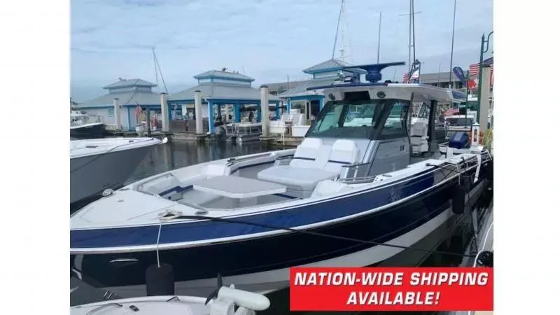 Slide: The Image of 2023 Formula 387 Center Console Sport boat docked, nationwide shipping available. - 1