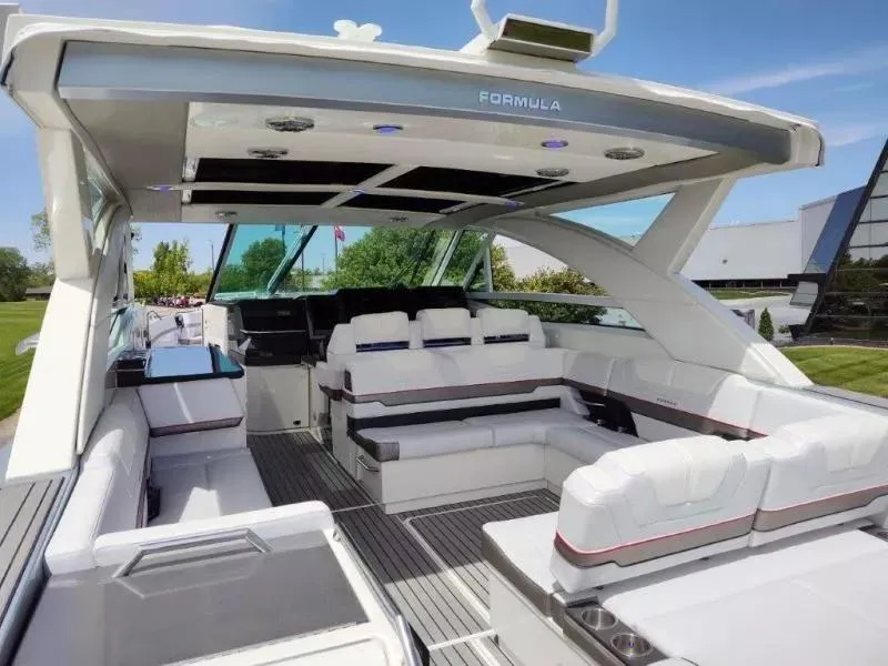 Slide: The Image of 2017 Formula 430 Super Sport Crossover luxury yacht interior with spacious seating and modern design. - 19