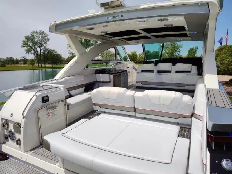 Slide: The Image of 2017 Formula 430 Super Sport Crossover boat interior with luxurious seating and modern design. - 20