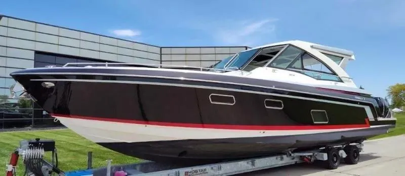 Slide: The Image of 2017 Formula 430 Super Sport Crossover boat on trailer, sleek design, modern architecture. - 3