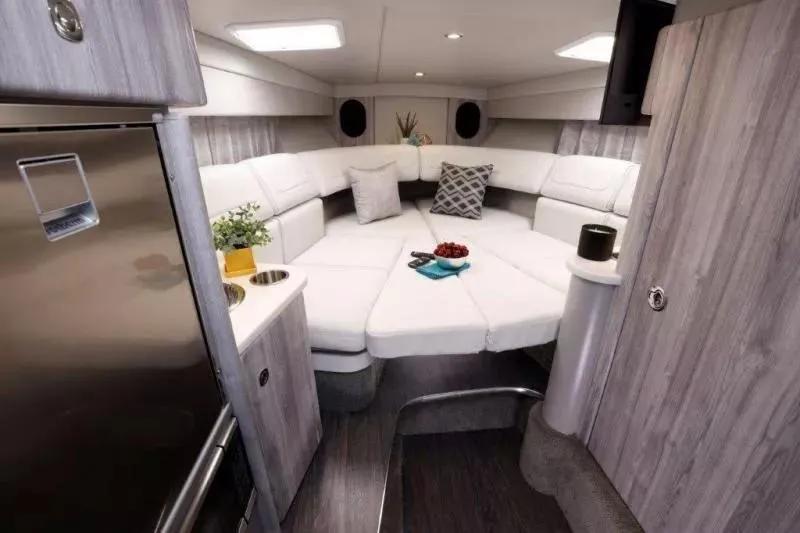 Slide: The Image of Luxurious interior of 2023 Formula 310 Sun Sport boat with modern seating and decor. - 3