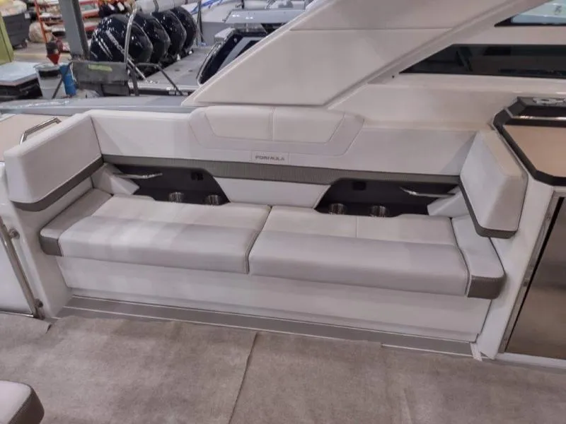 Slide: The Image of 2019 Formula 430 Super Sport Crossover interior seating area with modern design and comfortable upholstery. - 21