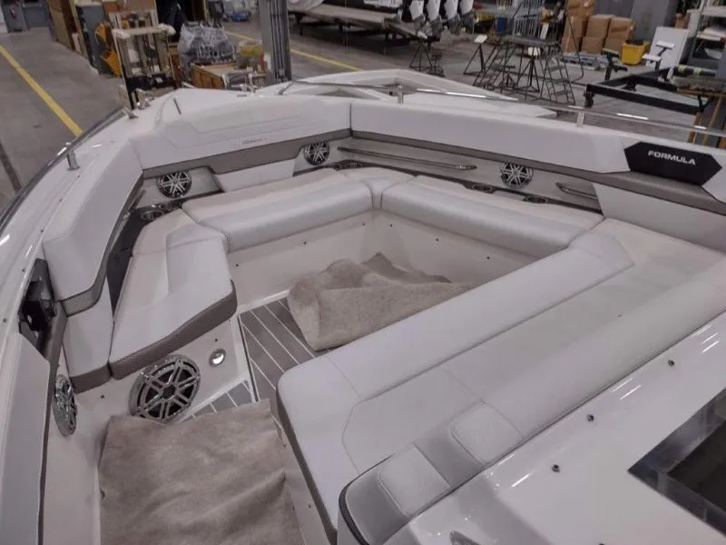 Slide: The Image of 2019 Formula 430 Super Sport Crossover boat interior with luxurious seating and modern design. - 25