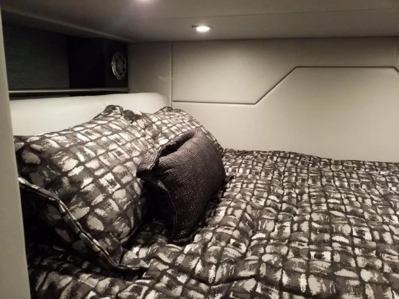 Slide: The Image of Luxurious cabin interior of 2019 Formula 430 Super Sport Crossover with patterned bedding. - 6