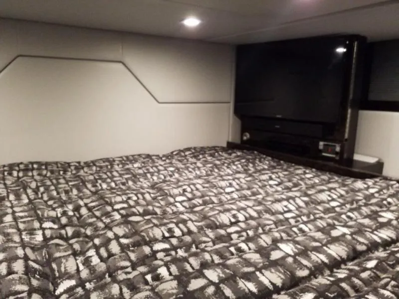 Slide: The Image of Interior cabin of 2019 Formula 430 Super Sport Crossover with bed and TV. - 7