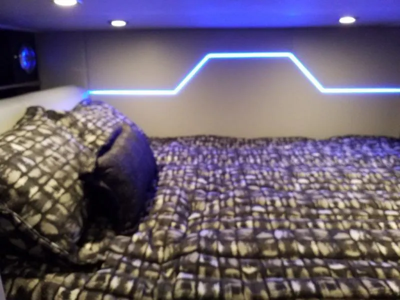 Slide: The Image of Luxurious bed in 2019 Formula 430 Super Sport Crossover with modern lighting. - 8