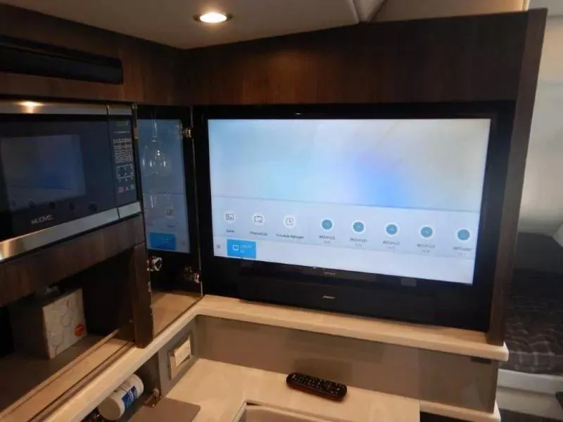 Slide: The Image of Interior of 2020 Formula 430 Super Sport Crossover with modern entertainment system. - 21