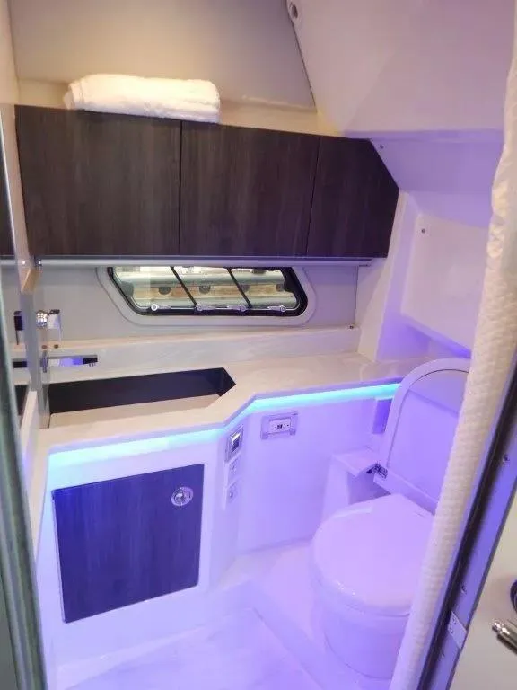 Slide: The Image of Luxurious bathroom interior of 2020 Formula 430 Super Sport Crossover yacht with modern amenities. - 23