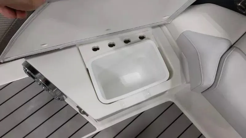 Slide: The Image of 2023 Formula 380 Super Sport Crossover OB boat sink and seating area. - 16