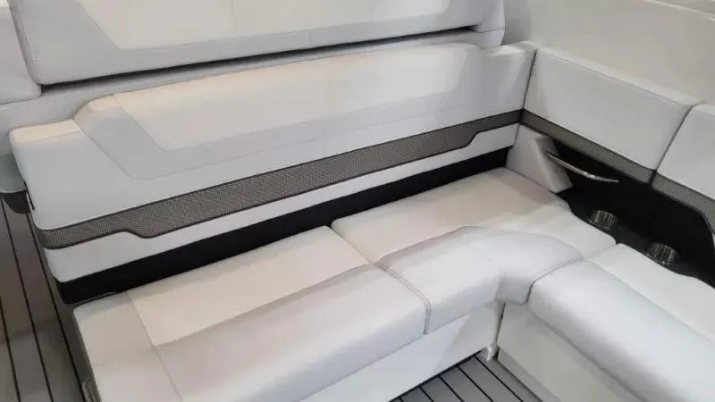 Slide: The Image of 2023 Formula 380 Super Sport Crossover OB interior seating, featuring sleek white upholstery. - 22