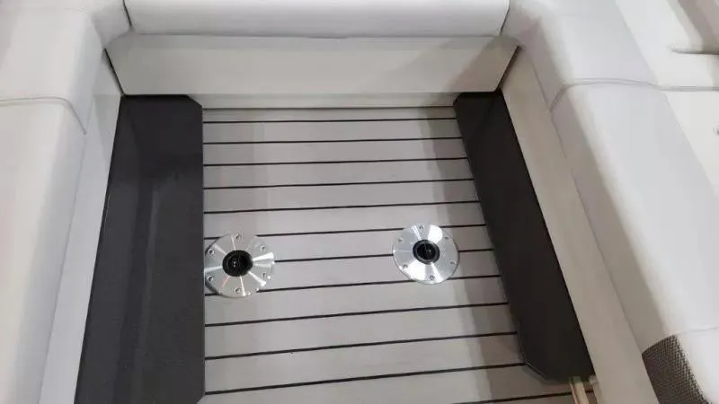 Slide: The Image of 2023 Formula 380 Super Sport Crossover OB interior seating area with sleek design. - 23