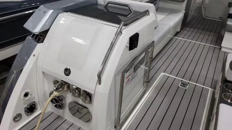 Slide: The Image of 2023 Formula 380 Super Sport Crossover OB boat interior with sleek design and modern amenities. - 8