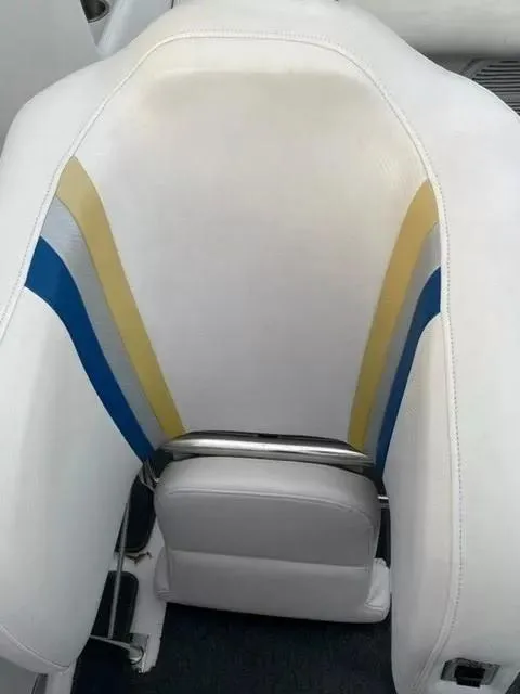 Slide: The Image of White and multicolored seat in 2014 Baja 35 Outlaw boat. - 11