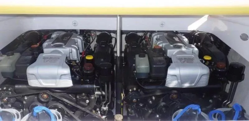 Slide: The Image of Twin engines of a 2014 Baja 35 Outlaw boat, showcasing powerful V8 configurations. - 15