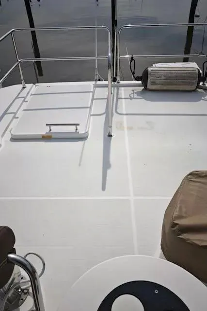 Slide: The Image of 2017 Beneteau Swift Trawler 30 deck with railing and equipment. - 24