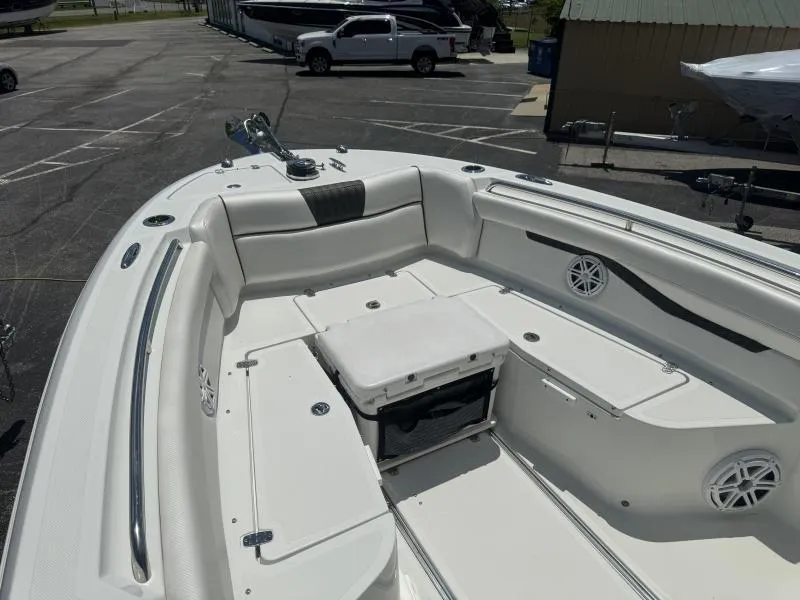 Slide: The Image of 2022 Wellcraft 262 Fisherman boat interior with seating and storage compartments. - 25