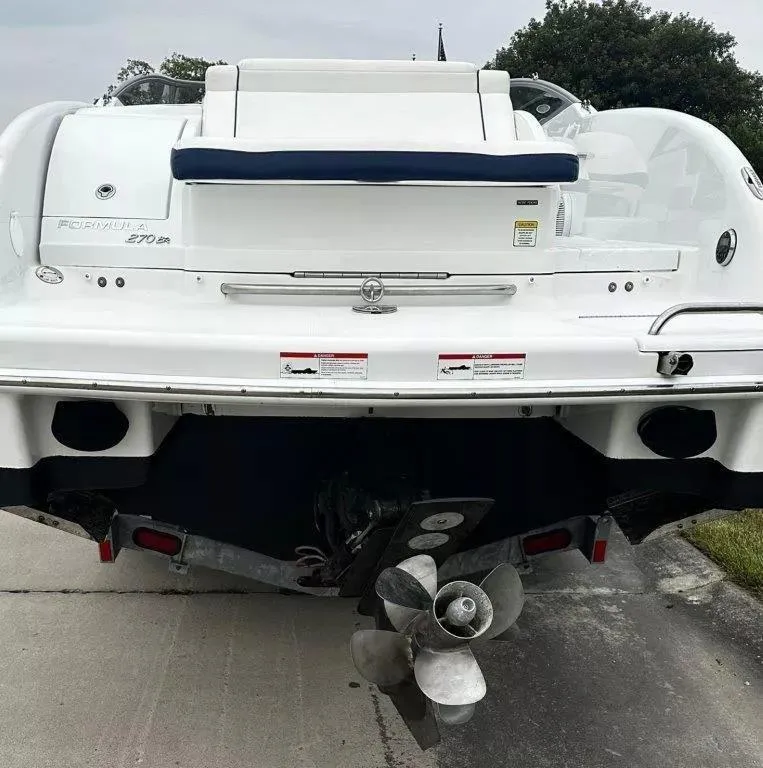 Slide: The Image of 2013 Formula 270 Bowrider boat rear view with propeller and swim platform. - 18