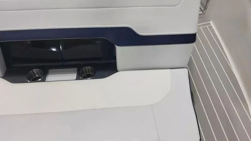 Slide: The Image of 2024 Formula 380 Super Sport Crossover OB interior seating with cup holders and sleek design. - 17