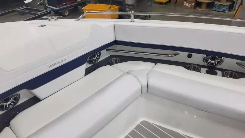 Slide: The Image of 2024 Formula 380 Super Sport Crossover OB interior with white seating and sleek design. - 20