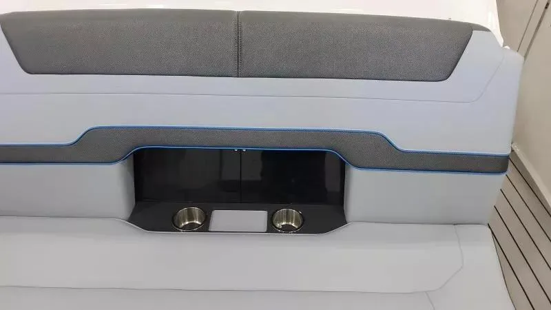 Slide: The Image of 2025 Formula 380 Super Sport Crossover OB boat seating with integrated cup holders. - 18