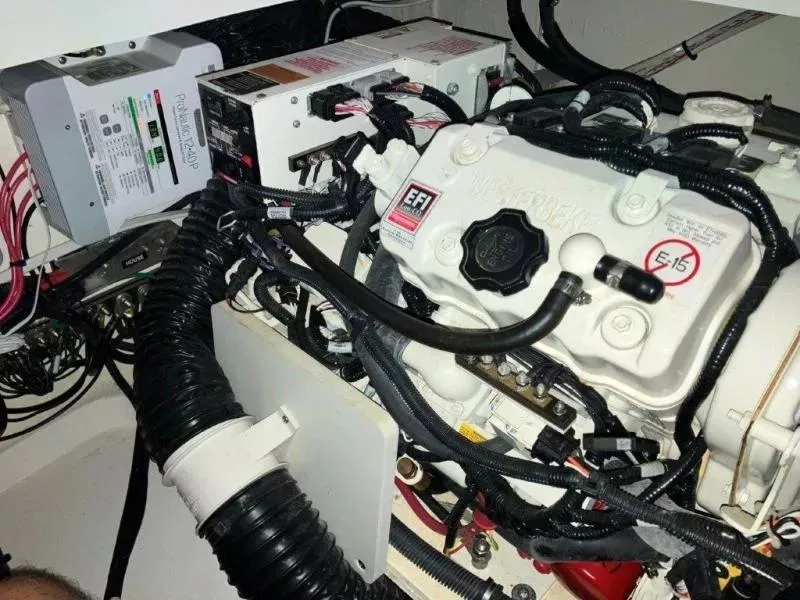 Slide: The Image of Engine compartment of 2020 Sea Ray Sundancer 320 OB with wiring and components. - 19