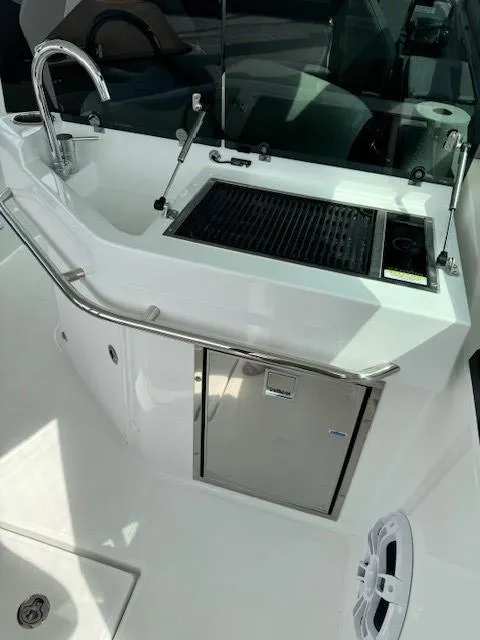 Slide: The Image of Outdoor kitchen on 2024 Beneteau Gran Turismo 32 yacht with grill and sink. - 14
