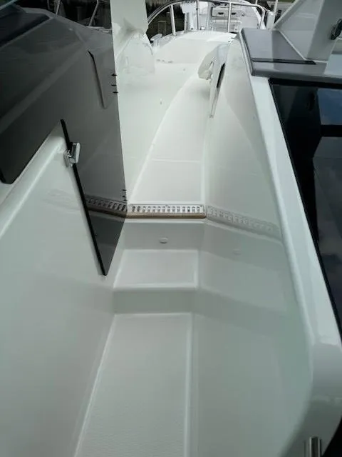 Slide: The Image of 2024 Beneteau Gran Turismo 32 yacht deck with sleek, modern design. - 17