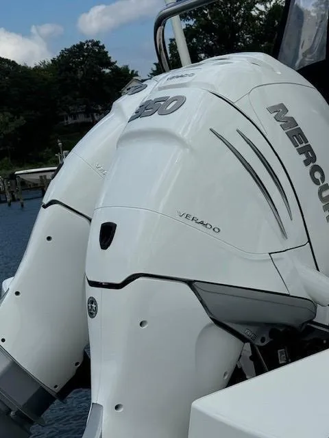Slide: The Image of Twin Mercury Verado outboard engines on a 2024 Beneteau Gran Turismo 32 boat. - 5