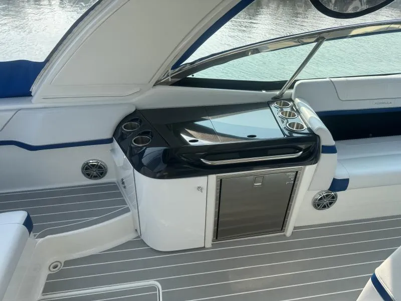 Slide: The Image of 2020 Formula Boats 350 Crossover Bowrider interior with sleek seating and modern amenities. - 20