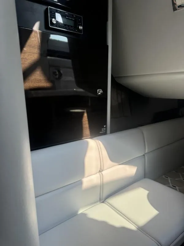 Slide: The Image of 2020 Formula Boats 350 Crossover Bowrider interior with sleek seating and modern design. - 8