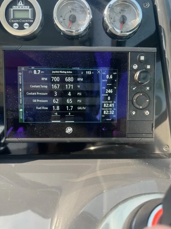 Slide: The Image of Dashboard of a 2020 Formula Boats 350 Crossover Bowrider showing engine metrics. - 9
