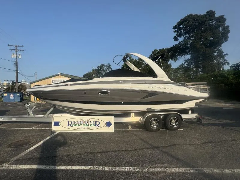 Slide: The Image of 2022 Crownline 265 SS boat on trailer at Rhode River Boat Sales. - 2