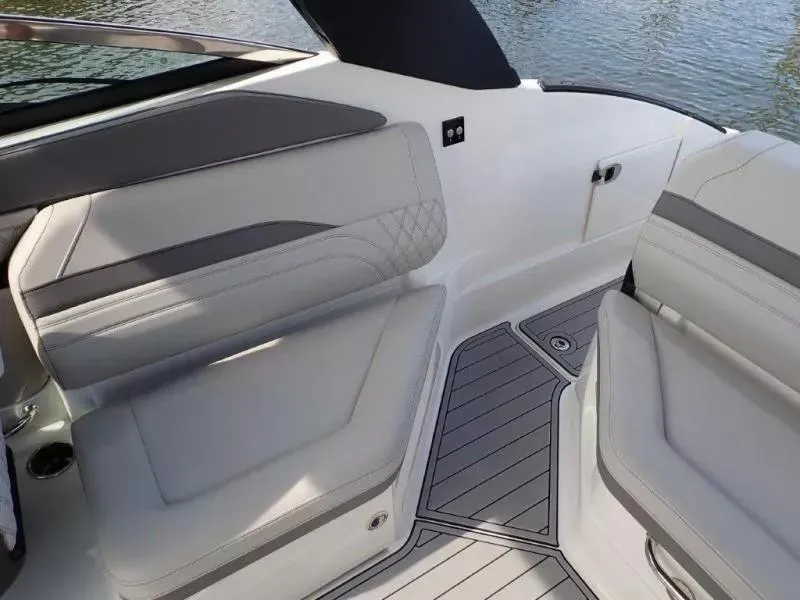 Slide: The Image of 2024 Sea Ray SLX 260 Outboard interior with sleek seating and modern design. - 20