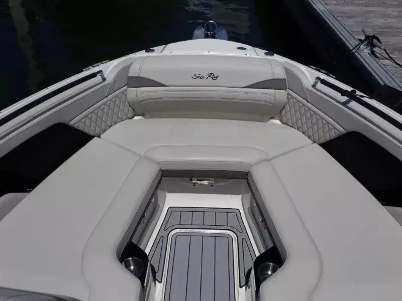 Slide: The Image of 2024 Sea Ray SLX 260 Outboard boat interior with luxurious seating and elegant design. - 8